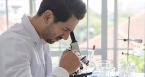 https://www.vecteezy.com/photo/8937899-young-scientist-medical-worker-in-lab-doing-a-microscope-analysis-in-a-laboratory-doing-research