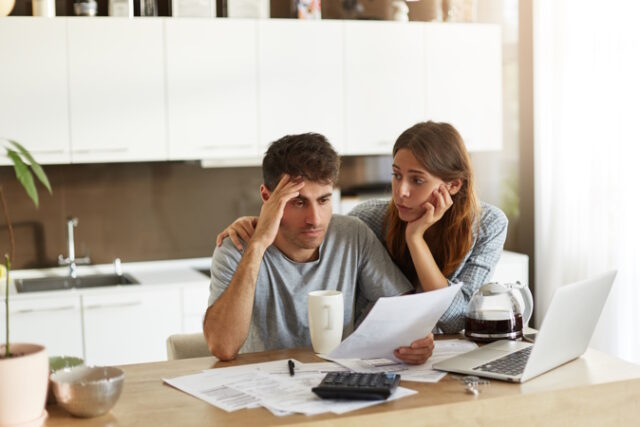 https://www.freepik.com/free-photo/young-couple-checking-their-family-budget_10113439.htm#query=debt&position=22&from_view=search&track=sph