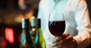 https://www.freepik.com/free-photo/bartender-holding-glass-red-wine_8405655.htm#query=wines&position=1&from_view=search&track=sph