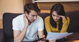 https://www.freepik.com/free-photo/couple-sitting-sofa-discussing-with-financial-documents-living-room_9597814.htm#query=couple%20economics&position=26&from_view=search&track=ais