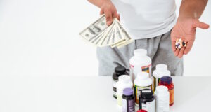 https://www.freepik.com/free-photo/cropped-image-young-sportsman-holding-vitamins-money_7836221.htm#query=costly%20drugs&position=14&from_view=search&track=ais