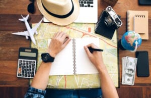https://www.freepik.com/premium-photo/male-hand-holding-pen-notebook-map-planning-trip-copy-space-travel-background_6595861.htm#query=vacation%20planning&position=25&from_view=search&track=ais