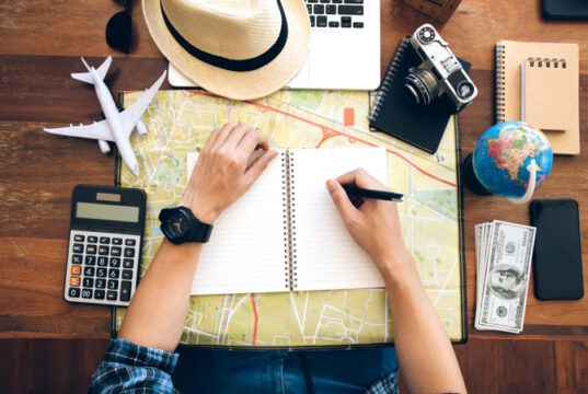 https://www.freepik.com/premium-photo/male-hand-holding-pen-notebook-map-planning-trip-copy-space-travel-background_6595861.htm#query=vacation%20planning&position=25&from_view=search&track=ais