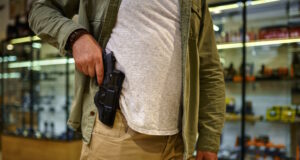 https://www.freepik.com/premium-photo/man-pulls-pistol-from-holster-gun-store-weapon-shop-interior-ammo-ammunition-assortment-firearms-choice-shooting-hobby-lifestyle-self-protection_16278768.htm#query=buying%20handgun&position=40&from_view=search&track=ais
