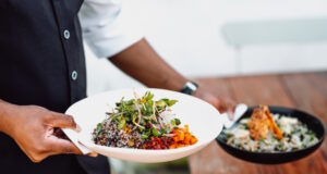 https://www.freepik.com/free-photo/midsection-waiter-serving-two-dishes-wooden-table_20712342.htm#query=food%20serving&position=14&from_view=search&track=ais