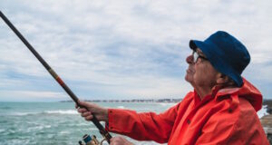 https://www.freepik.com/free-photo/portrait-senior-man-fishing-sea-enjoying-life-fishing-sport-concept_10104183.htm#query=outer%20banks%20fishing&position=12&from_view=search&track=ais