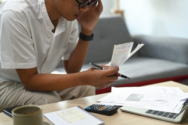 https://www.freepik.com/premium-photo/serious-man-using-laptop-computer-calculating-household-expenses_25055673.htm#page=2&query=paying%20bills&position=34&from_view=search&track=ais