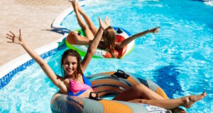 https://www.freepik.com/free-photo/young-beautiful-women-smiling-sunbathing-relaxing-swimming-pool_7591650.htm#query=pool%20time&position=21&from_view=search&track=ais