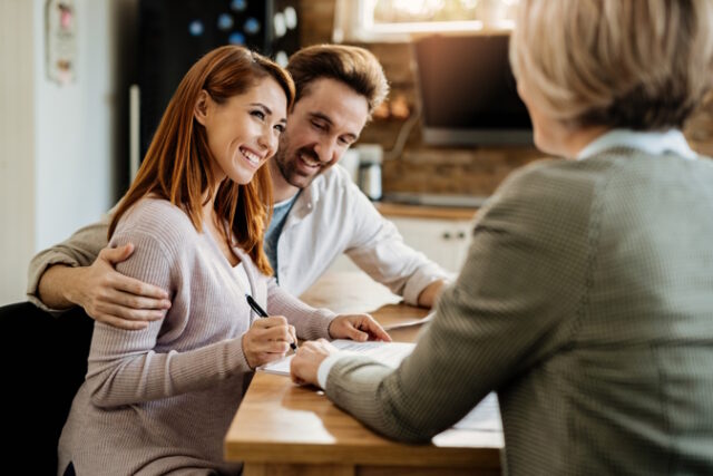 https://www.freepik.com/free-photo/young-happy-woman-her-husband-signing-agreement-with-insurance-agent-during-meeting_25751448.htm#query=family%20mortgage&position=0&from_view=search&track=ais