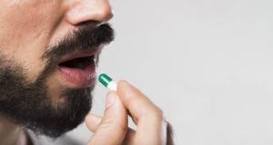 https://www.freepik.com/free-photo/close-up-adult-male-swallowing-capsule_6843994.htm#query=pill%20in%20mouth&position=3&from_view=search&track=robertav1_2_sidr
