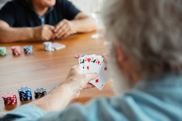https://www.freepik.com/free-photo/group-happy-mature-friends-playing-cards-drinking-wine_9367612.htm#query=seniors%20play%20cards&position=2&from_view=search&track=ais