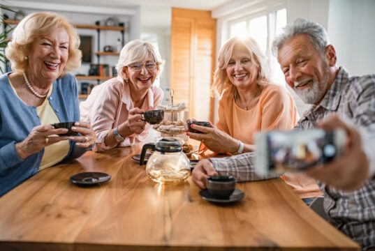 https://www.freepik.com/free-photo/happy-mature-friends-having-fun-while-using-mobile-phone-talking-selfie-home_25910518.htm#query=senior%20friends&position=18&from_view=search&track=ais