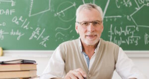 https://www.freepik.com/free-photo/senior-professor-sitting-desk-lecture-room_4943871.htm#query=university%20professor&position=4&from_view=search&track=ais
