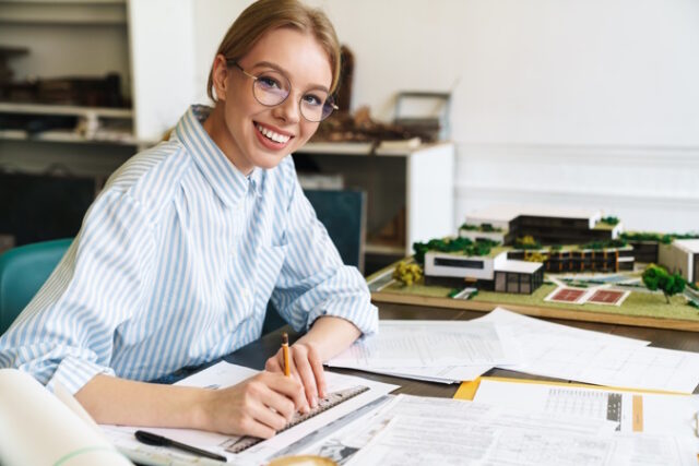 https://www.freepik.com/premium-photo/smiling-blonde-woman-architect-eyeglasses-working-with-drawings-while-designing-draft-workplace_20342316.htm#query=woman%20beginner%20investor&position=12&from_view=search&track=ais