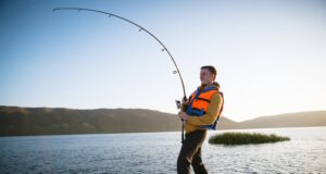 https://www.freepik.com/premium-photo/youn-man-fishing-from-boat_18233869.htm#query=fishing&position=40&from_view=search&track=sph