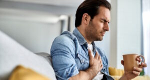https://www.freepik.com/free-photo/young-man-feeling-sick-holding-his-chest-pain-while-drinking-tea-living-room_26343755.htm#query=breathing%20problems&position=0&from_view=search&track=robertav1_2_sidr