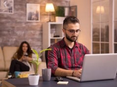 https://www.freepik.com/free-photo/bearded-freelancer-working-laptop-living-room-girlfriend-relaxing-sofa-background-using-her-phone-chips_21518690.htm#query=looking%20computer&position=10&from_view=search&track=ais