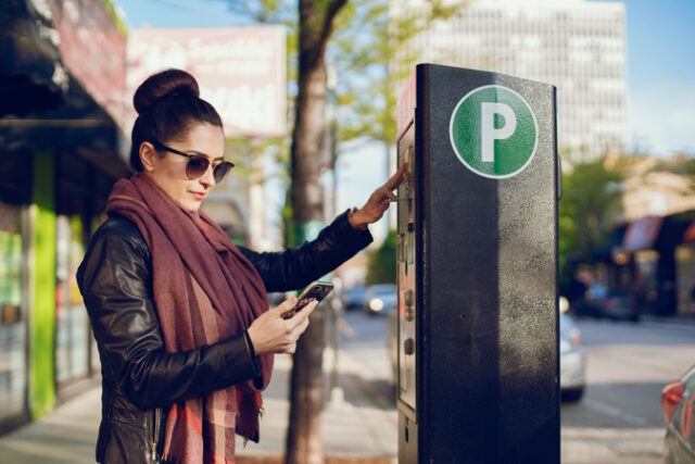 woman pays for Parking https://www.freepik.com/free-photo/beautiful-young-woman-pays-parking-meter-street_2630680.htm#page=3&query=illegal%20parking&position=10&from_view=search&track=robertav1_2_sidr