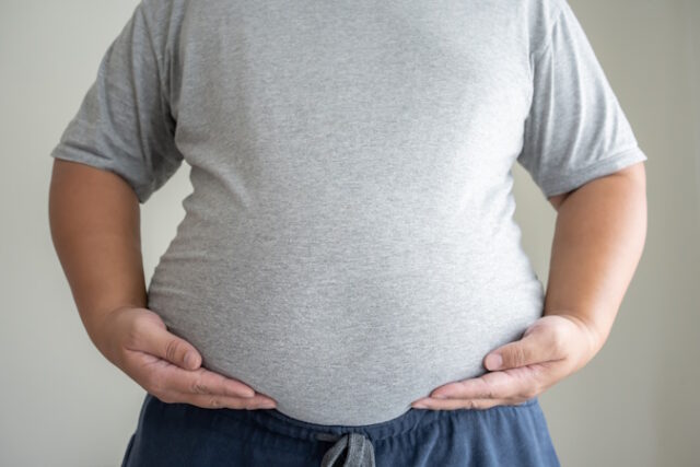 Big fat man standing to show real size with causual clothing. https://www.freepik.com/premium-photo/big-fat-man-standing-show-real-size-with-causual-clothing_28995993.htm?query=waist+circumference&log-in=email