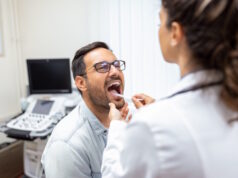 https://www.freepik.com/free-photo/doctor-using-inspection-spatula-examine-patient-throat-ent-doctor-doing-throat-exam-patient-opened-his-mouth-throat-checkup_28001807.htm#query=tonsils&position=4&from_view=search&track=sph