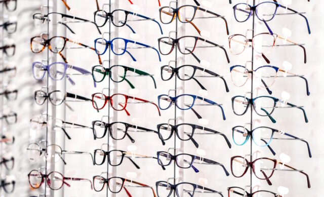 exhibition of glasses at shelves. Fashionable spectacles shown on a wall at the optical shop. Closeup. https://www.freepik.com/premium-photo/exhibition-glasses-shelves-fashionable-spectacles-shown-wall-optical-shop-closeup_26691701.htm#page=2&query=eye%20glasses&position=38&from_view=search&track=ais