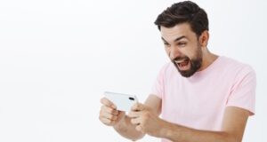 https://www.freepik.com/free-photo/expressive-bearded-man-pink-tshirt_10961701.htm#query=phone%20games&position=25&from_view=search&track=ais