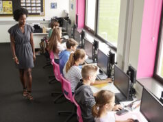 https://www.freepik.com/premium-photo/female-teacher-supervising-line-high-school-students-working-screens-computer-class_28549984.htm#query=kids%20in%20computer%20class&position=7&from_view=search&track=ais