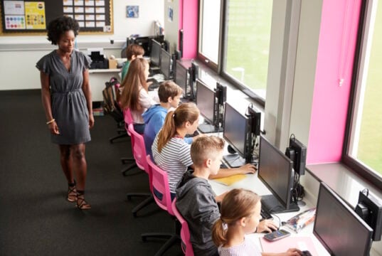 https://www.freepik.com/premium-photo/female-teacher-supervising-line-high-school-students-working-screens-computer-class_28549984.htm#query=kids%20in%20computer%20class&position=7&from_view=search&track=ais