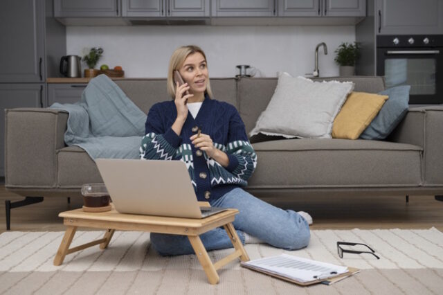 full-shot-woman-talking-phone https://www.freepik.com/free-photo/full-shot-woman-talking-phone_22110072.htm#query=work%20from%20home&position=6&from_view=search&track=ais