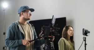 https://www.freepik.com/free-photo/man-filming-with-professional-camera-new-movie_17342914.htm#query=film%20industry&position=38&from_view=search&track=robertav1_2_sidr