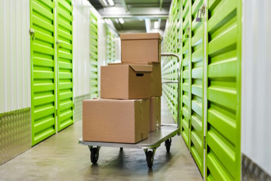 https://www.freepik.com/premium-photo/surface-image-cart-with-cardboard-boxes-empty-hall-self-storage-facility-copy-space_12121211.htm#query=storage&position=6&from_view=search&track=sph