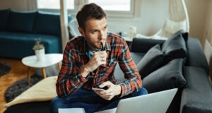https://www.freepik.com/free-photo/thoughtful-man-using-mobile-phone-laptop-while-working-home_25750152.htm#query=freelancer&position=31&from_view=search&track=robertav1_2_sidr