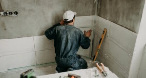 https://www.freepik.com/premium-photo/worker-repairman-puts-large-ceramic-tiles_10356690.htm#query=home%20renovations&position=48&from_view=search&track=ais