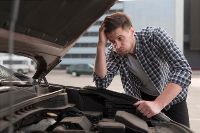 young-man-trying-repair-car https://www.freepik.com/free-photo/young-man-trying-repair-car_7715130.htm#query=car%20breakdown&position=44&from_view=search&track=robertav1_2_sidr