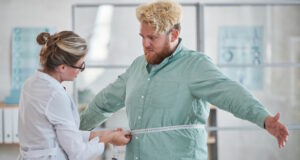 https://www.freepik.com/premium-photo/young-nutritionist-measuring-overweight-man-with-centimeter-tape-prescribing-diet_17635800.htm#page=2&query=clinical%20weight%20loss&position=19&from_view=search&track=ais