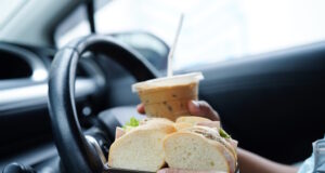 https://www.freepik.com/premium-photo/asian-woman-driver-hold-ice-coffee-cup-sandwich-bread-eat-drink-car-dangerous-risk-accident_35309701.htm#query=road%20trip%20snacks&position=25&from_view=search&track=locales
