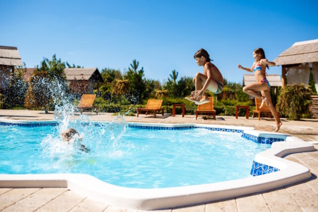 https://www.freepik.com/free-photo/cheerful-children-rejoicing-jumping-swimming-pool_7598872.htm#query=swimming&position=41&from_view=search&track=sph