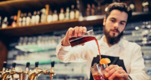 https://www.freepik.com/free-photo/handsome-bartender-making-drinking-cocktails-counter_6641534.htm#query=bartender&position=37&from_view=search&track=sph
