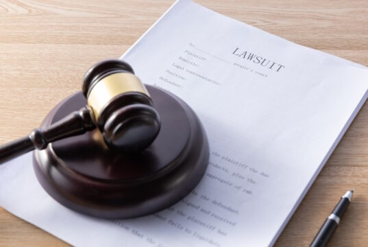 https://www.freepik.com/free-photo/high-angle-shot-gavel-lawsuit-papers-wooden-surface_25929286.htm#query=lawsuit&position=0&from_view=search&track=sph