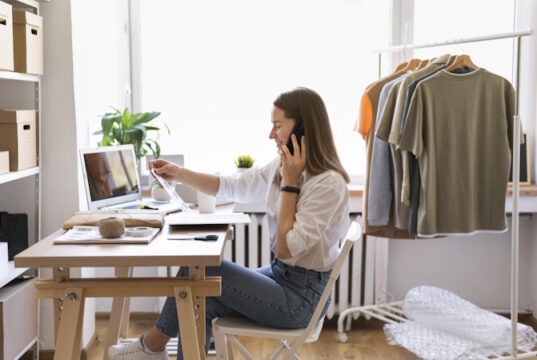 https://www.freepik.com/free-photo/medium-shot-woman-sitting-desk_14532432.htm#query=online%20clothing%20store&position=16&from_view=search&track=ais