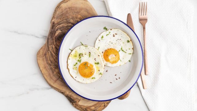 top-view-breakfast-fried-eggs-plate-with-cutlery https://www.freepik.com/free-photo/top-view-breakfast-fried-eggs-plate-with-cutlery_13107401.htm#query=breakfast%20eggs&position=4&from_view=search&track=ais