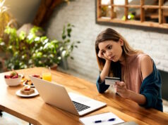 https://www.freepik.com/free-photo/young-woman-feeling-sad-while-checking-her-online-bank-account-laptop-home_28998858.htm#query=credit%20card%20score&position=30&from_view=search&track=ais