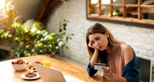 https://www.freepik.com/free-photo/young-woman-feeling-sad-while-checking-her-online-bank-account-laptop-home_28998858.htm#query=credit%20card%20score&position=30&from_view=search&track=ais