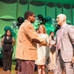 E – Little Brother Roby Pilar-Garcia with BBBS Board Chair Willy Gomez