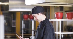 https://www.freepik.com/free-photo/chef-with-tablet_4374296.htm#query=cafe%20worker%20checking%20phone&position=10&from_view=search&track=ais