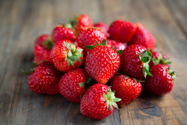 Fresh strawberries on wooden table. https://www.freepik.com/free-photo/fresh-strawberries-wooden-table_4283034.htm#query=strawberries&position=19&from_view=search&track=sph