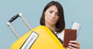 https://www.freepik.com/free-photo/front-view-woman-holding-yellow-baggage-with-postponed-sign_9067375.htm#page=3&query=tsa%20delays&position=20&from_view=search&track=ais