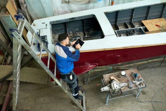 https://www.freepik.com/premium-photo/man-repairing-boats-customs-workshop_8603968.htm#query=boat%20maker&position=11&from_view=search&track=ais