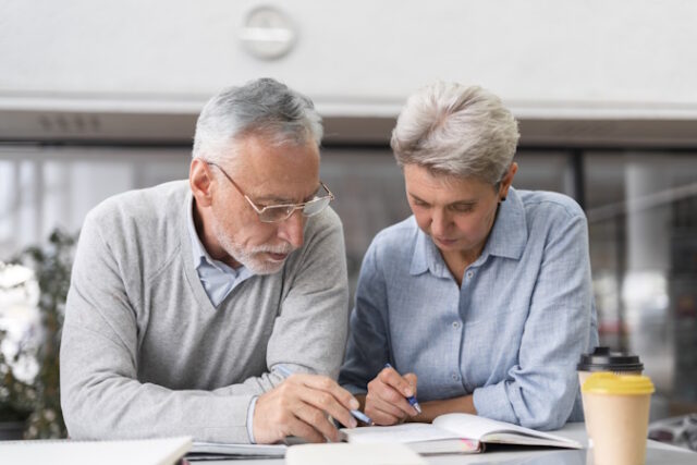 https://www.freepik.com/free-photo/medium-shot-people-learning-together_20942038.htm#query=senior%20couple%20bills&position=32&from_view=search&track=ais