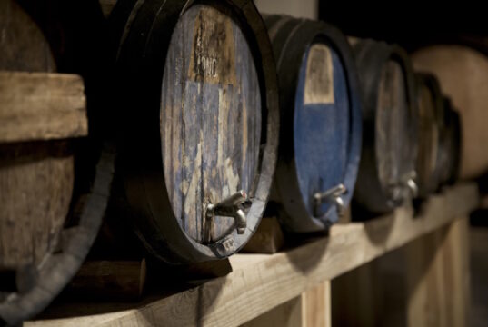 https://www.freepik.com/free-photo/wine-cellar-with-old-wine-barrels-arrangement_27260304.htm#query=wine%20barrels%20with%20grapes&position=11&from_view=search&track=ais